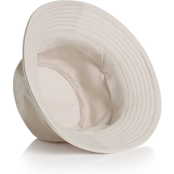 A cream bucket hat with a wide brim, featuring an inner lining and a subtle logo.