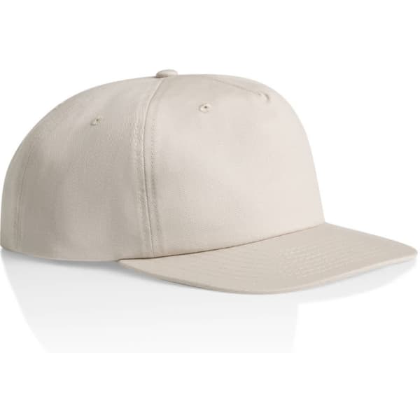 A light beige cotton cap with a flat brim, featuring a logo on the front.