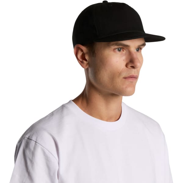 A black cotton cap with a flat brim, worn by a person in a white T-shirt, featuring a logo.