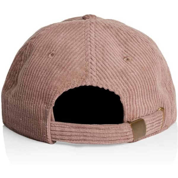 A corduroy cap in a dusty rose colour with a contrasting adjustable strap and a logo on the back.