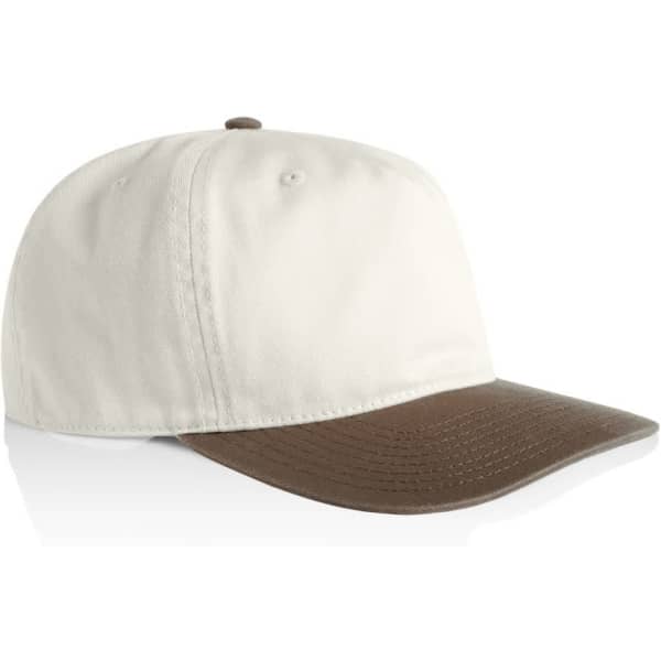 A two-tone cap with a cream-coloured body and a brown peak. It has a logo on the front.