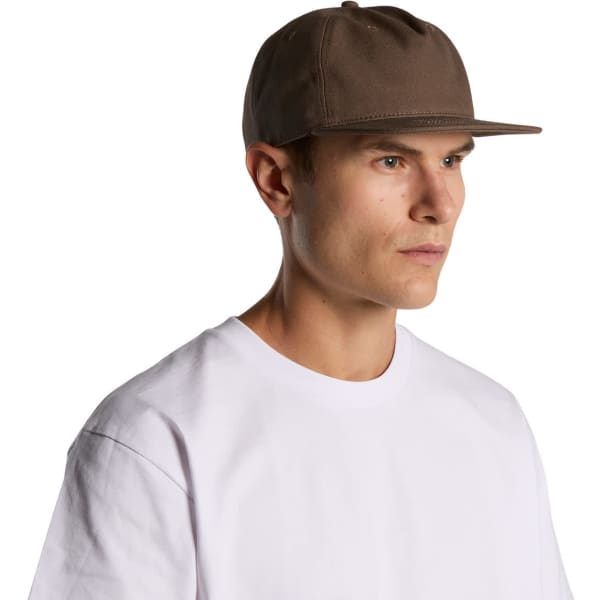 A brown cap worn by a man with a neutral expression, featuring a simple design and a logo.