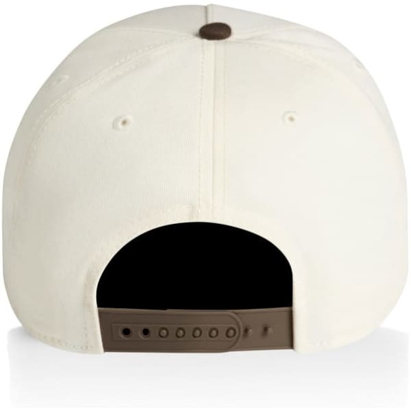 A two-tone cap in cream with a brown adjustable strap at the back and a button on top.