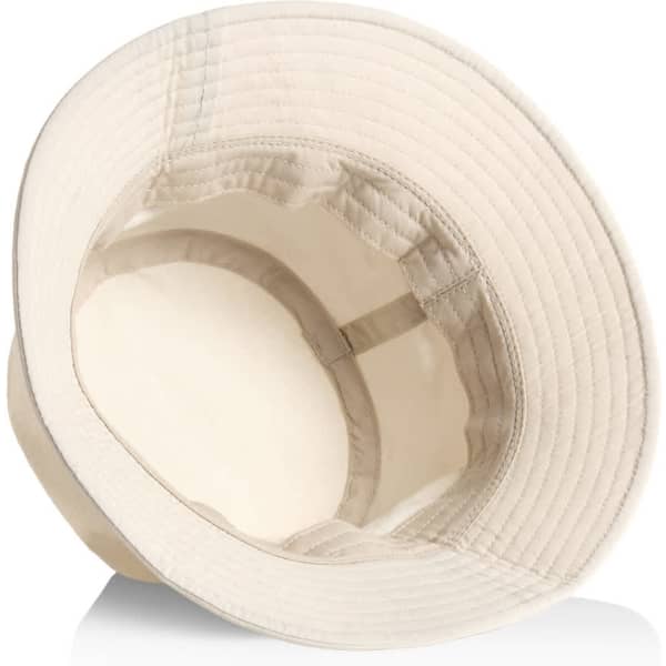 A nylon bucket hat in a light beige colour with a wide brim and an inner lining. It features a branded logo.