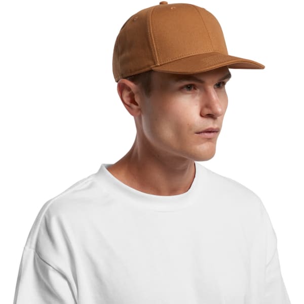 A brown canvas cap featuring a structured design and a logo, paired with a plain white T-shirt.