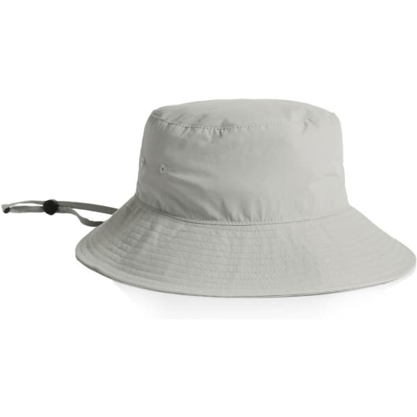 A light grey nylon wide brim bucket hat with a drawstring and a logo on the side.