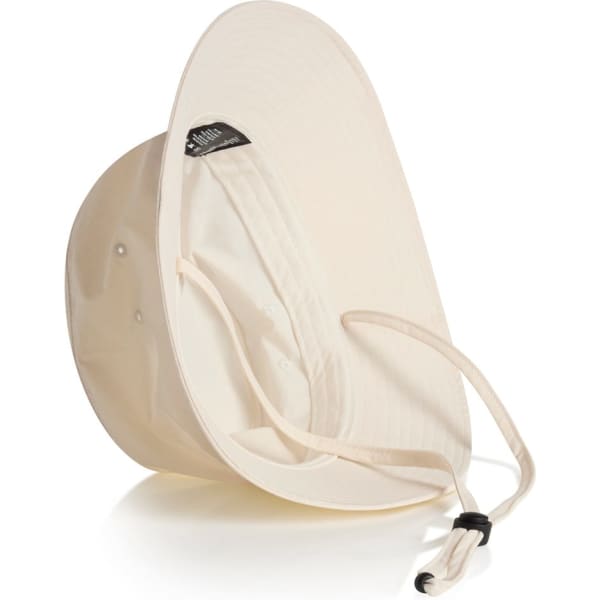 A cream nylon wide brim bucket hat featuring an adjustable chin strap and an inner lining. It has a logo on the inside.