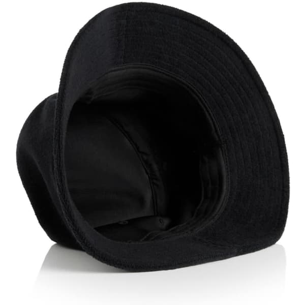 A black Terry Bucket Hat with a wide brim, featuring a logo on the inside.