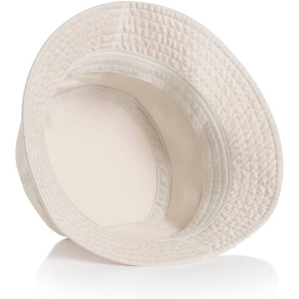 A cream-coloured faded bucket hat with a textured design and a wide brim, featuring a logo inside.