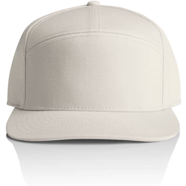A beige 7-panel cap featuring a structured design and a front panel with a logo.