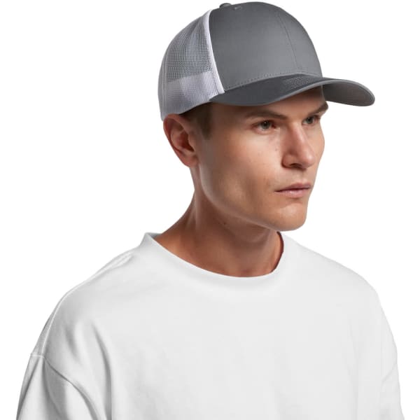 A grey Mesh Contrast Trucker Cap with a mesh backing and a curved peak, worn by a model in a white shirt.