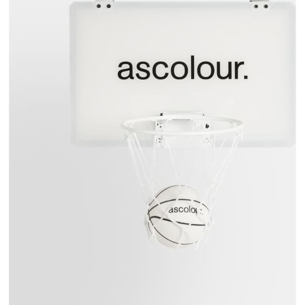 A mini basketball hoop set featuring a white backboard and a small basketball, both with branding.