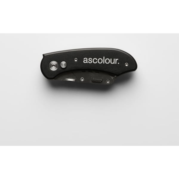 A compact black utility knife with a hinge design and a logo on the side, featuring a folding blade mechanism.