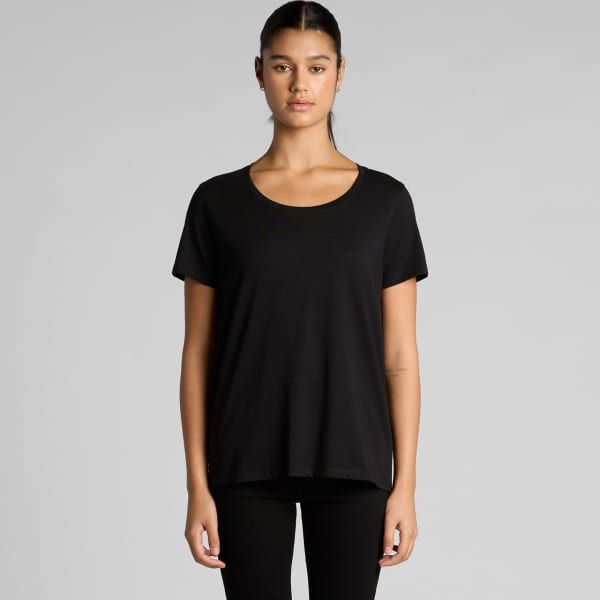 A black t-shirt with a scoop neckline and short sleeves, featuring a logo. The model is standing with a neutral expression.