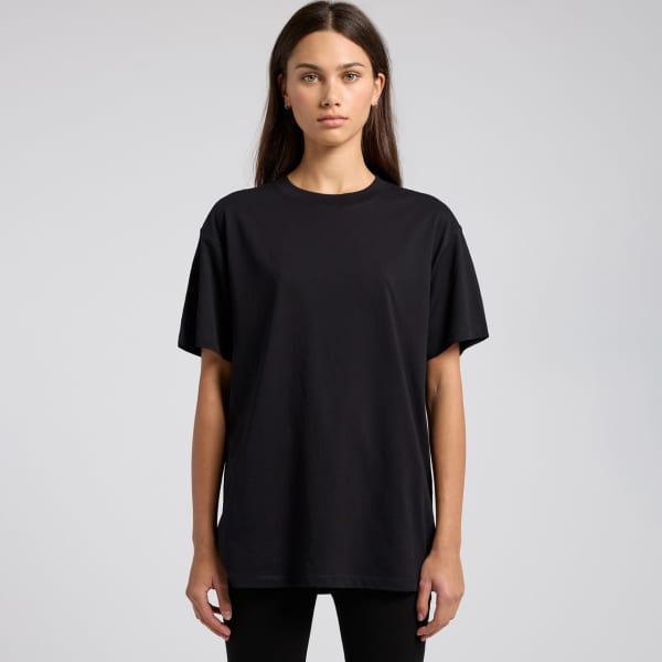 A black oversized t-shirt with short sleeves and a relaxed fit. The shirt has a subtle branding logo.