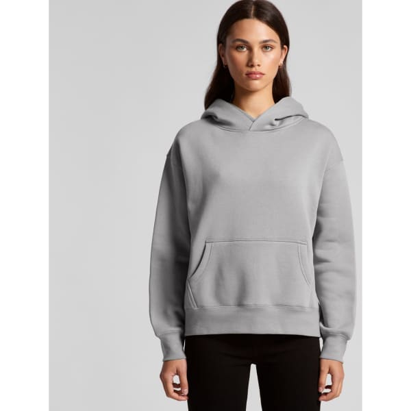 A grey hoodie with a front pocket and a hood, featuring a logo. Model displaying the garment.