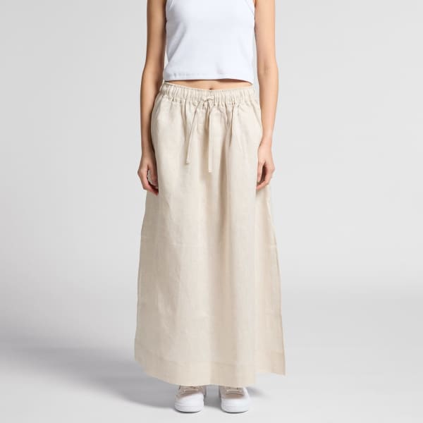 A linen skirt in a light beige colour, featuring an elastic waistband and a relaxed, flowing design.