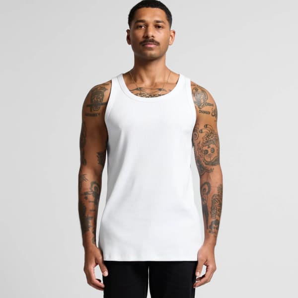 A white organic rib singlet displayed on a tattooed male model against a neutral background. The singlet features a logo.