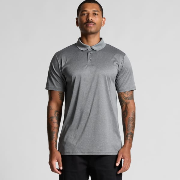 A grey polo shirt with a collar, featuring short sleeves and a logo, displayed on a model.