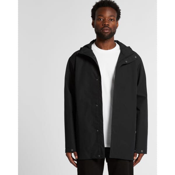 A black jacket with a hood, featuring a front zipper and buttons, displayed on a model. It has a logo.