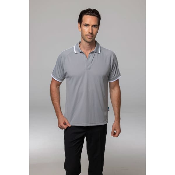 A man wearing a grey polo shirt with contrasting white accents and a logo on the hem.