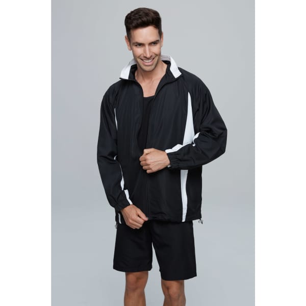 A black and white men's track jacket with a hood and zippered front, worn over a black tank top and shorts.