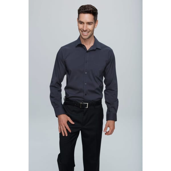 A long sleeve, button-up shirt in dark grey, featuring a pocket and worn with black trousers.