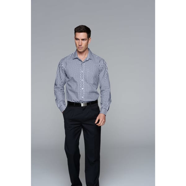 A long sleeve button-up shirt in a checkered pattern with navy and white colours, worn with dark trousers.