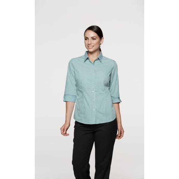 A green and white checkered button-up shirt with 3/4 sleeves, styled on a model against a neutral background.