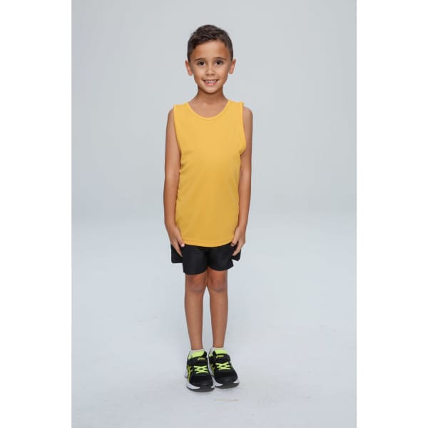 A child stands smiling, wearing a yellow singlet and black shorts, with black and green shoes. The image features a branding logo.