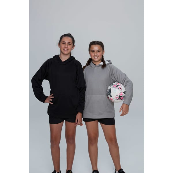 Two girls pose in CRUSADER KIDS HOODIES, one in black and the other in grey, holding a sports ball.