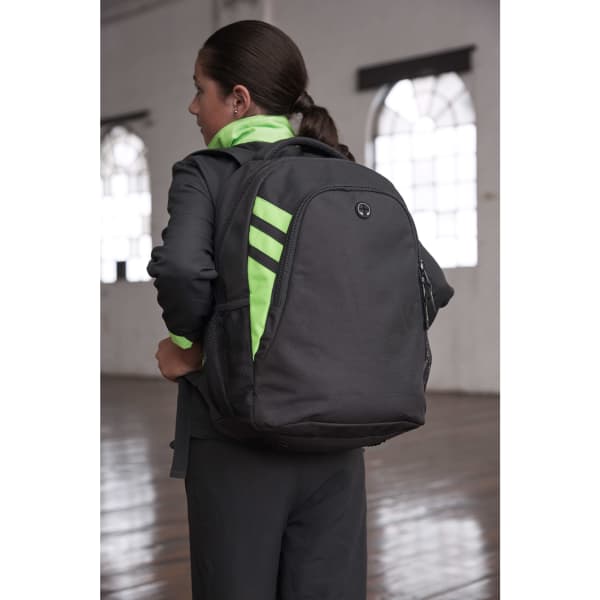 A black backpack with bright green stripes and a logo, featuring mesh side pockets and adjustable straps.