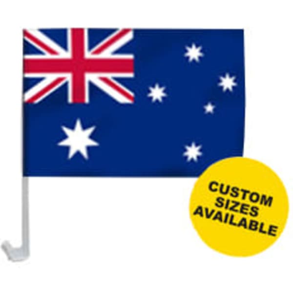 A small Australian flag on a white flagpole, featuring the Union Jack and Southern Cross design.