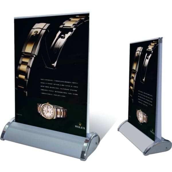A double sided pull-up banner with a sleek silver base, featuring a black background and an image of a watch.
