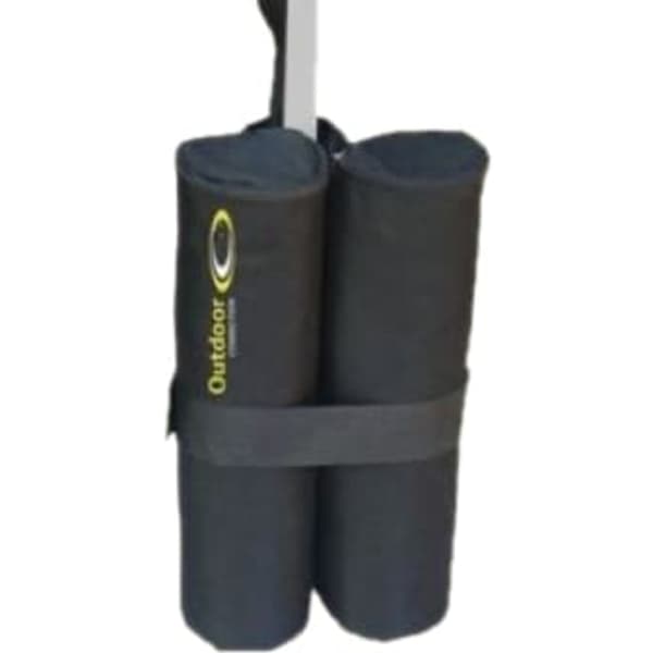A black sand bag product featuring two cylindrical compartments, secured with a strap and featuring a logo.