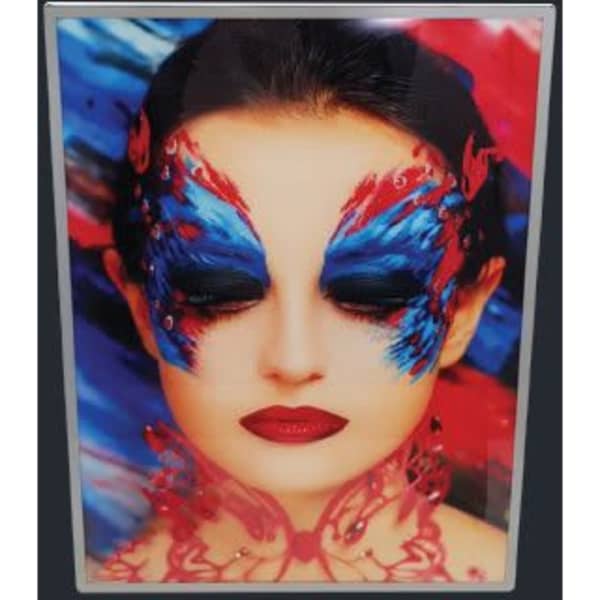 A Slimline A2 light box featuring a vibrant image of a model with striking blue and red face paint.