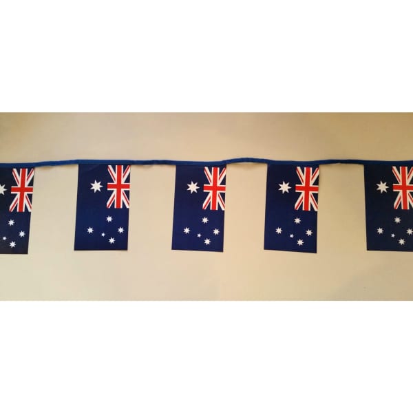 A decorative paper bunting featuring Australian flags and stars, in blue, red, and white, strung on a blue cord.
