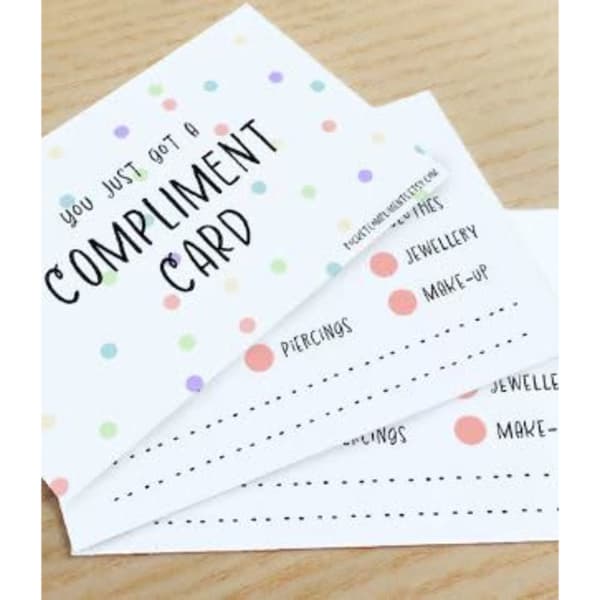 A set of three compliment cards featuring a colourful polka dot design on a white background.