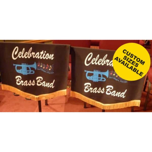 Two black music stand covers featuring a blue trumpet design and white text with fringe at the bottom.
