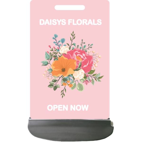 A footpath sign with a pink background and a floral design featuring roses, poppies, and greenery.