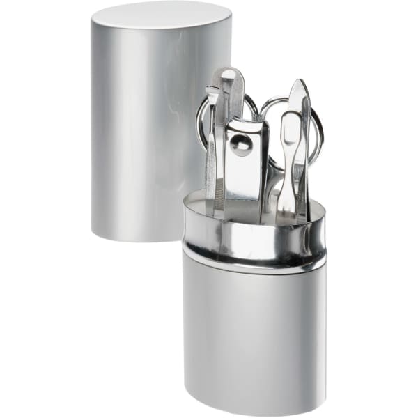 A silver manicure set featuring various tools, including clippers and pushers, in a cylindrical case.