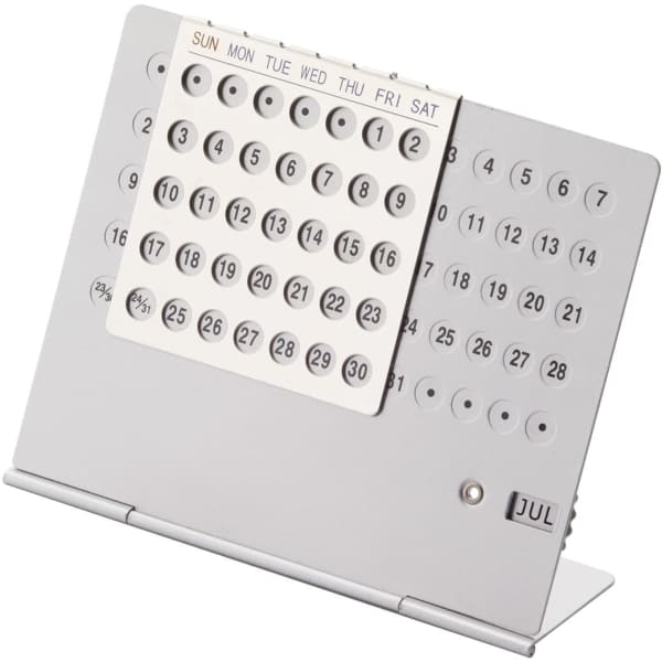 A silver folding perpetual calendar featuring calendar dates, days of the week, and a stand.
