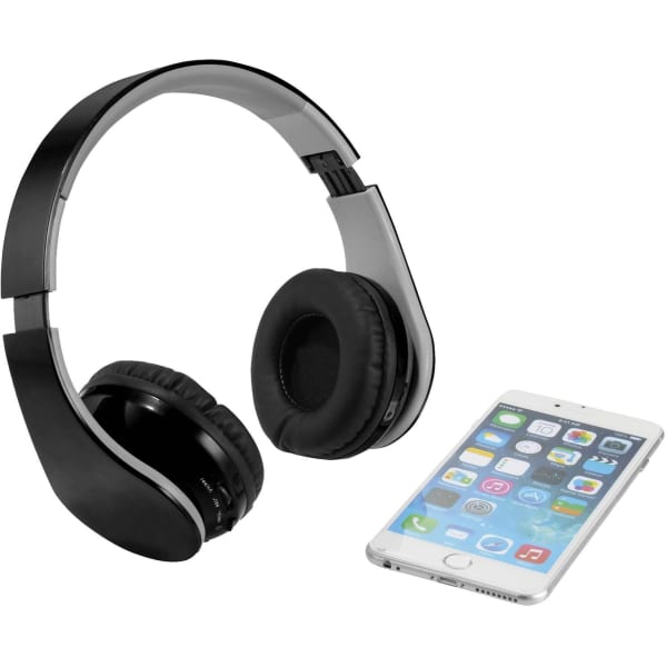 Black Rhea Bluetooth headphones placed next to a smartphone, featuring a sleek design and a logo.