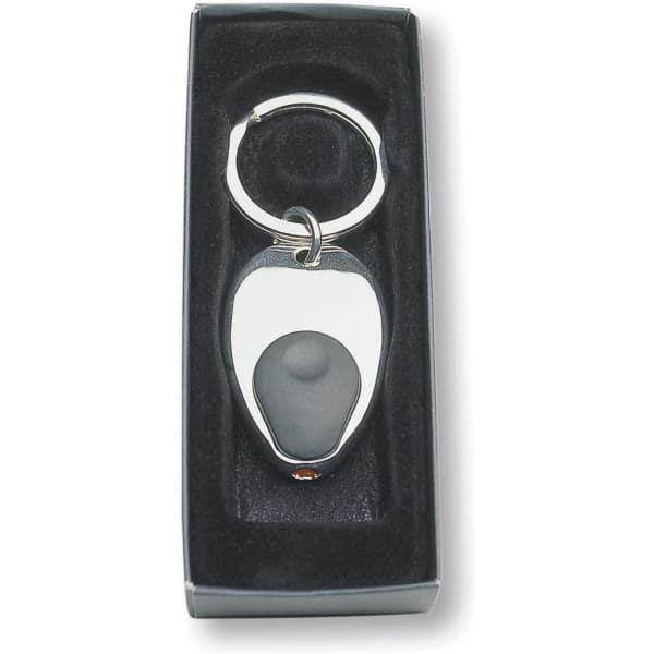 A silver keyring with a built-in torch, presented in a black velvet-lined box.