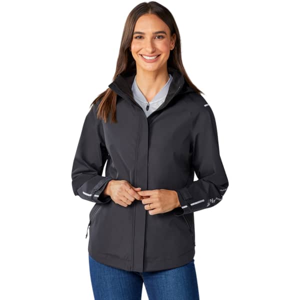 A black women's softshell jacket featuring a zip-up front and a hood, with reflective details and a logo.