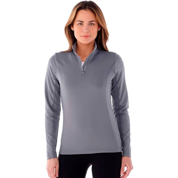 A woman wearing a grey knit quarter zip jacket, featuring long sleeves and a small zipper.