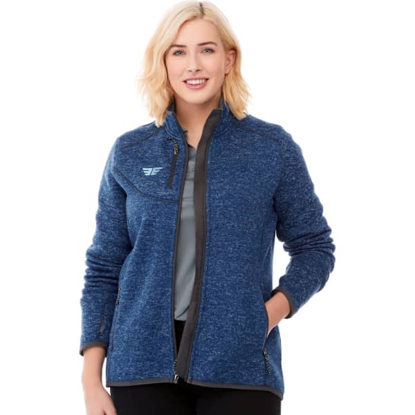 A women's knit jacket in a rich blue colour, featuring a zip front and a logo on the chest.