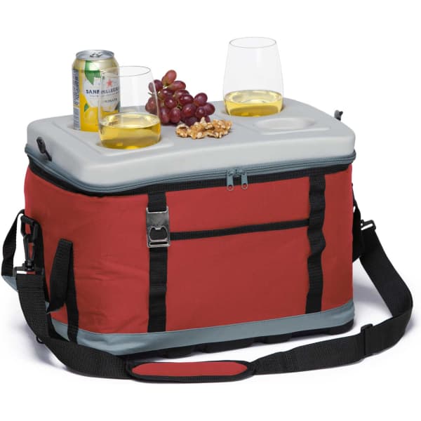 A red EVA Big Chill Cooler with a grey lid, containing two glasses, a can, grapes, and nuts on top.