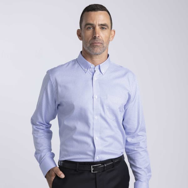 A men's button-up shirt in a blue check pattern, featuring long sleeves and a fitted design. It has a small logo.