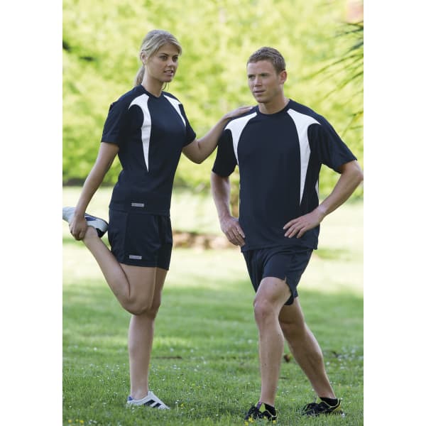 A pair of individuals in athletic attire, featuring the Dri Gear Spliced Zenith Tee in black with white accents.